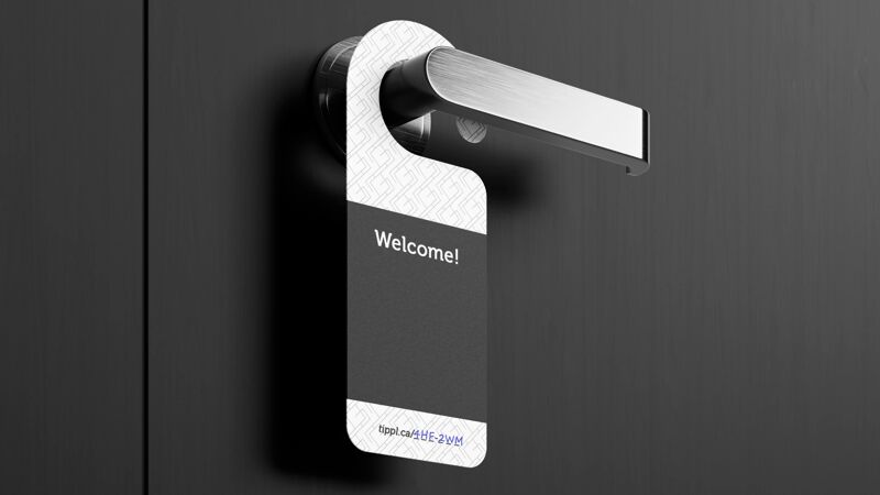 A door hanger on a hotel room door handle letting guests know who serviced their room, and discreetly giving a link to the housekeeper's cashless tipping page